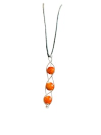 a necklace with an orange bead and a silver chain